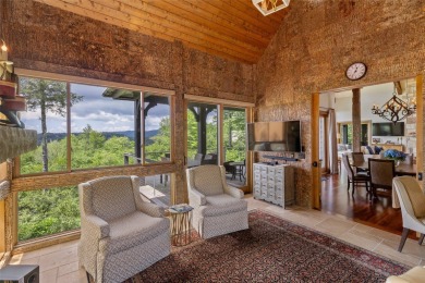 This custom home is noteworthy for its elegant stone facade on Cullasaja Club in North Carolina - for sale on GolfHomes.com, golf home, golf lot