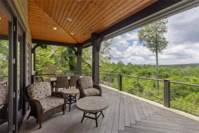 This custom home is noteworthy for its elegant stone facade on Cullasaja Club in North Carolina - for sale on GolfHomes.com, golf home, golf lot