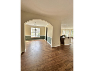 ALL BRICK HOME. 3BR 2BA WITH ALL NEW LAMINATE WOOD FLOORING IN on Barefoot Resort and Golf Club  in South Carolina - for sale on GolfHomes.com, golf home, golf lot