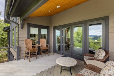 This custom home is noteworthy for its elegant stone facade on Cullasaja Club in North Carolina - for sale on GolfHomes.com, golf home, golf lot