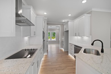 This luxury home at Tidewater at Ocean Isle Beach is now on Brick Landing Plantation Yacht and Golf Club in North Carolina - for sale on GolfHomes.com, golf home, golf lot