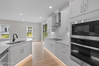 This luxury home at Tidewater at Ocean Isle Beach is now on Brick Landing Plantation Yacht and Golf Club in North Carolina - for sale on GolfHomes.com, golf home, golf lot