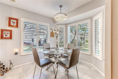 The POND Views are amazing at this beautifully updated, end unit on Timber Pines Golf Course in Florida - for sale on GolfHomes.com, golf home, golf lot