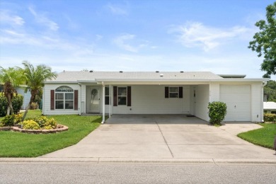TRIPLE WIDE**NO STEPS**Walk-in Level with Sidewalk. 3/2 Split on Zellwood Station Country Club in Florida - for sale on GolfHomes.com, golf home, golf lot