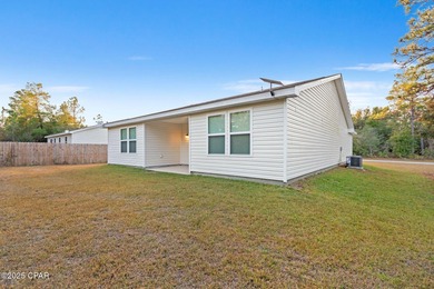 Discover modern Florida living in this move in ready 3-bedroom on Sunny Hills Golf and Country Club in Florida - for sale on GolfHomes.com, golf home, golf lot