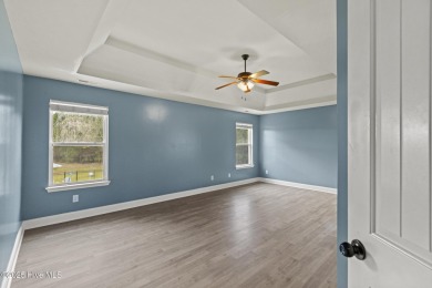 Welcome to 107 Pine Lakes Drive in Maple Hill, NC--a beautiful on Bear Trail Golf Club in North Carolina - for sale on GolfHomes.com, golf home, golf lot