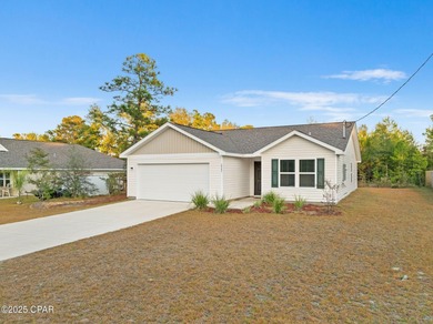 Discover modern Florida living in this move in ready 3-bedroom on Sunny Hills Golf and Country Club in Florida - for sale on GolfHomes.com, golf home, golf lot