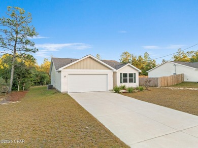 Discover modern Florida living in this move in ready 3-bedroom on Sunny Hills Golf and Country Club in Florida - for sale on GolfHomes.com, golf home, golf lot