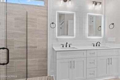 This luxury home at Tidewater at Ocean Isle Beach is now on Brick Landing Plantation Yacht and Golf Club in North Carolina - for sale on GolfHomes.com, golf home, golf lot