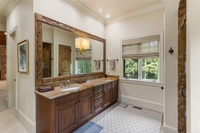 This custom home is noteworthy for its elegant stone facade on Cullasaja Club in North Carolina - for sale on GolfHomes.com, golf home, golf lot