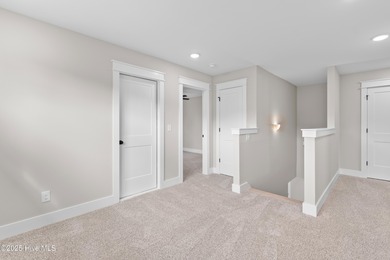 This luxury home at Tidewater at Ocean Isle Beach is now on Brick Landing Plantation Yacht and Golf Club in North Carolina - for sale on GolfHomes.com, golf home, golf lot