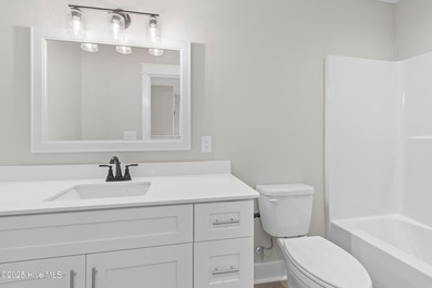 This luxury home at Tidewater at Ocean Isle Beach is now on Brick Landing Plantation Yacht and Golf Club in North Carolina - for sale on GolfHomes.com, golf home, golf lot