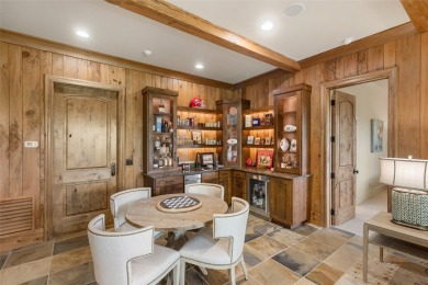 This custom home is noteworthy for its elegant stone facade on Cullasaja Club in North Carolina - for sale on GolfHomes.com, golf home, golf lot