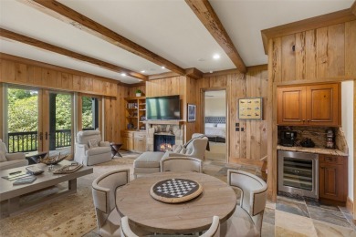 This custom home is noteworthy for its elegant stone facade on Cullasaja Club in North Carolina - for sale on GolfHomes.com, golf home, golf lot