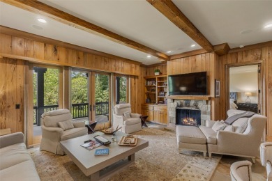 This custom home is noteworthy for its elegant stone facade on Cullasaja Club in North Carolina - for sale on GolfHomes.com, golf home, golf lot