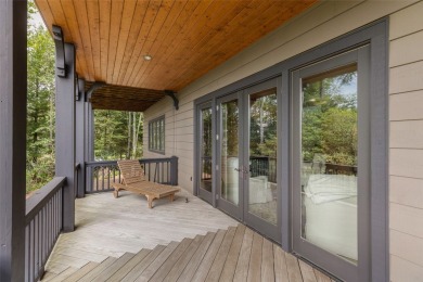 This custom home is noteworthy for its elegant stone facade on Cullasaja Club in North Carolina - for sale on GolfHomes.com, golf home, golf lot