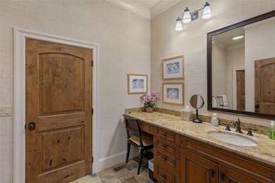 This custom home is noteworthy for its elegant stone facade on Cullasaja Club in North Carolina - for sale on GolfHomes.com, golf home, golf lot