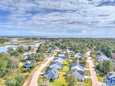 This luxury home at Tidewater at Ocean Isle Beach is now on Brick Landing Plantation Yacht and Golf Club in North Carolina - for sale on GolfHomes.com, golf home, golf lot
