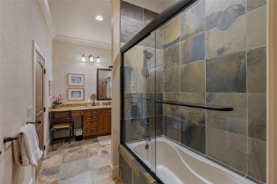 This custom home is noteworthy for its elegant stone facade on Cullasaja Club in North Carolina - for sale on GolfHomes.com, golf home, golf lot