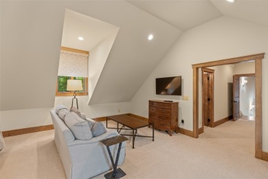 This custom home is noteworthy for its elegant stone facade on Cullasaja Club in North Carolina - for sale on GolfHomes.com, golf home, golf lot