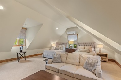 This custom home is noteworthy for its elegant stone facade on Cullasaja Club in North Carolina - for sale on GolfHomes.com, golf home, golf lot