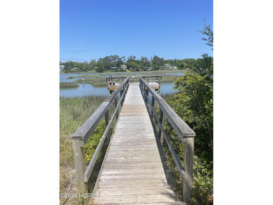 This luxury home at Tidewater at Ocean Isle Beach is now on Brick Landing Plantation Yacht and Golf Club in North Carolina - for sale on GolfHomes.com, golf home, golf lot