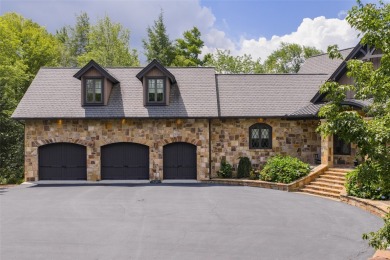 This custom home is noteworthy for its elegant stone facade on Cullasaja Club in North Carolina - for sale on GolfHomes.com, golf home, golf lot