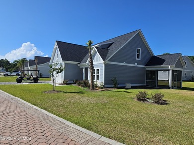 This luxury home at Tidewater at Ocean Isle Beach is now on Brick Landing Plantation Yacht and Golf Club in North Carolina - for sale on GolfHomes.com, golf home, golf lot