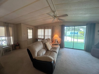 Discover incredible potential in this fully furnished home, ripe on Lake Fairways Country Club in Florida - for sale on GolfHomes.com, golf home, golf lot