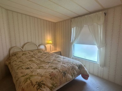 Discover incredible potential in this fully furnished home, ripe on Lake Fairways Country Club in Florida - for sale on GolfHomes.com, golf home, golf lot