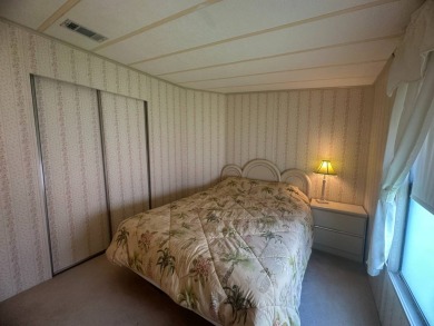 Discover incredible potential in this fully furnished home, ripe on Lake Fairways Country Club in Florida - for sale on GolfHomes.com, golf home, golf lot