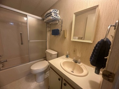 Discover incredible potential in this fully furnished home, ripe on Lake Fairways Country Club in Florida - for sale on GolfHomes.com, golf home, golf lot