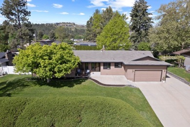 Stunning VIEW home boasts one of the best LOCATIONS in the on Liberty Lake Golf Club in Washington - for sale on GolfHomes.com, golf home, golf lot