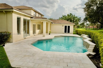 STUNNING HOME IN THE PRESTIGIOUS WESTON HILLS COUNTRY CLUB.DON'T on Weston Hills Country Club in Florida - for sale on GolfHomes.com, golf home, golf lot
