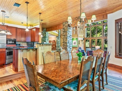 This impressive home boasts a distinctive yet captivating on Lake Toxaway Country Club in North Carolina - for sale on GolfHomes.com, golf home, golf lot