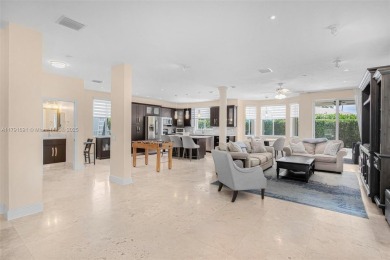 Exquisite 4BR/4BA pool home nestled on a private cul-de-sac in on Weston Hills Country Club in Florida - for sale on GolfHomes.com, golf home, golf lot