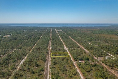 Welcome to Indian Lake Estates! This beautiful half-acre lot is on Indian Lake Estates Golf and Country Club in Florida - for sale on GolfHomes.com, golf home, golf lot
