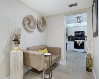 Meticulously remodeled, fully furnished, one bedroom, one bath on Ocean Village Golf Course in Florida - for sale on GolfHomes.com, golf home, golf lot