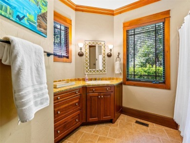 This impressive home boasts a distinctive yet captivating on Lake Toxaway Country Club in North Carolina - for sale on GolfHomes.com, golf home, golf lot