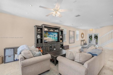 Exquisite 4BR/4BA pool home nestled on a private cul-de-sac in on Weston Hills Country Club in Florida - for sale on GolfHomes.com, golf home, golf lot