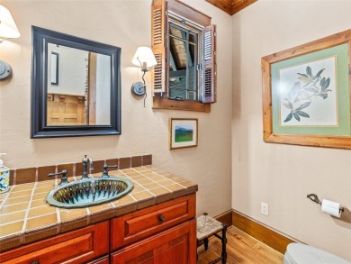 This impressive home boasts a distinctive yet captivating on Lake Toxaway Country Club in North Carolina - for sale on GolfHomes.com, golf home, golf lot