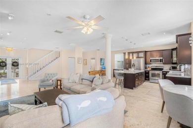 Exquisite 4BR/4BA pool home nestled on a private cul-de-sac in on Weston Hills Country Club in Florida - for sale on GolfHomes.com, golf home, golf lot