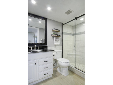 Meticulously remodeled, fully furnished, one bedroom, one bath on Ocean Village Golf Course in Florida - for sale on GolfHomes.com, golf home, golf lot