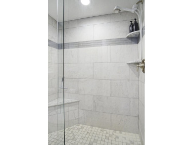 Meticulously remodeled, fully furnished, one bedroom, one bath on Ocean Village Golf Course in Florida - for sale on GolfHomes.com, golf home, golf lot