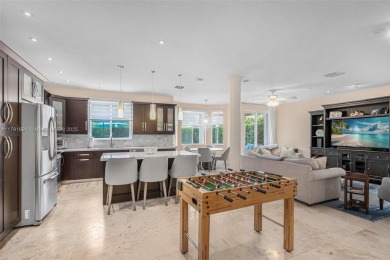 Exquisite 4BR/4BA pool home nestled on a private cul-de-sac in on Weston Hills Country Club in Florida - for sale on GolfHomes.com, golf home, golf lot