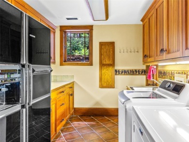 This impressive home boasts a distinctive yet captivating on Lake Toxaway Country Club in North Carolina - for sale on GolfHomes.com, golf home, golf lot
