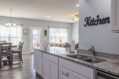 Experience effortless Ozark living in this spacious 3-bed on Ledgestone Country Club and Golf Course in Missouri - for sale on GolfHomes.com, golf home, golf lot