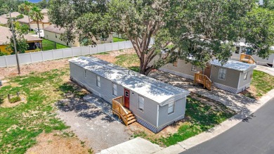 (Ver abajo en espanol)  All Ages Community - Lot rent $850 on Diamond Hill Golf and Country Club in Florida - for sale on GolfHomes.com, golf home, golf lot