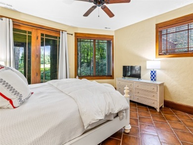 This impressive home boasts a distinctive yet captivating on Lake Toxaway Country Club in North Carolina - for sale on GolfHomes.com, golf home, golf lot