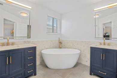 Exquisite 4BR/4BA pool home nestled on a private cul-de-sac in on Weston Hills Country Club in Florida - for sale on GolfHomes.com, golf home, golf lot